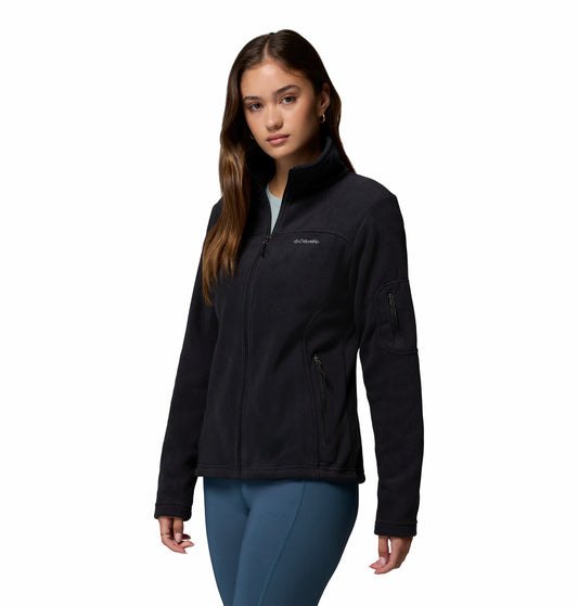 Woman wearing a black jacket with Columbia logo on a white background