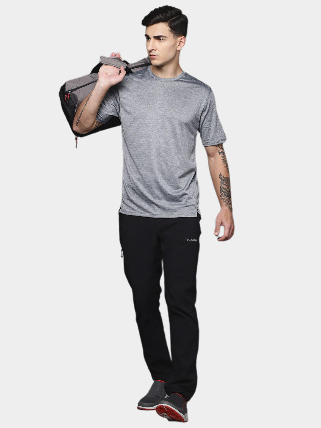 A Men Wearing Columbia Men Black Triple Canyon II Fall Hiking Pant (Sun Protection)
