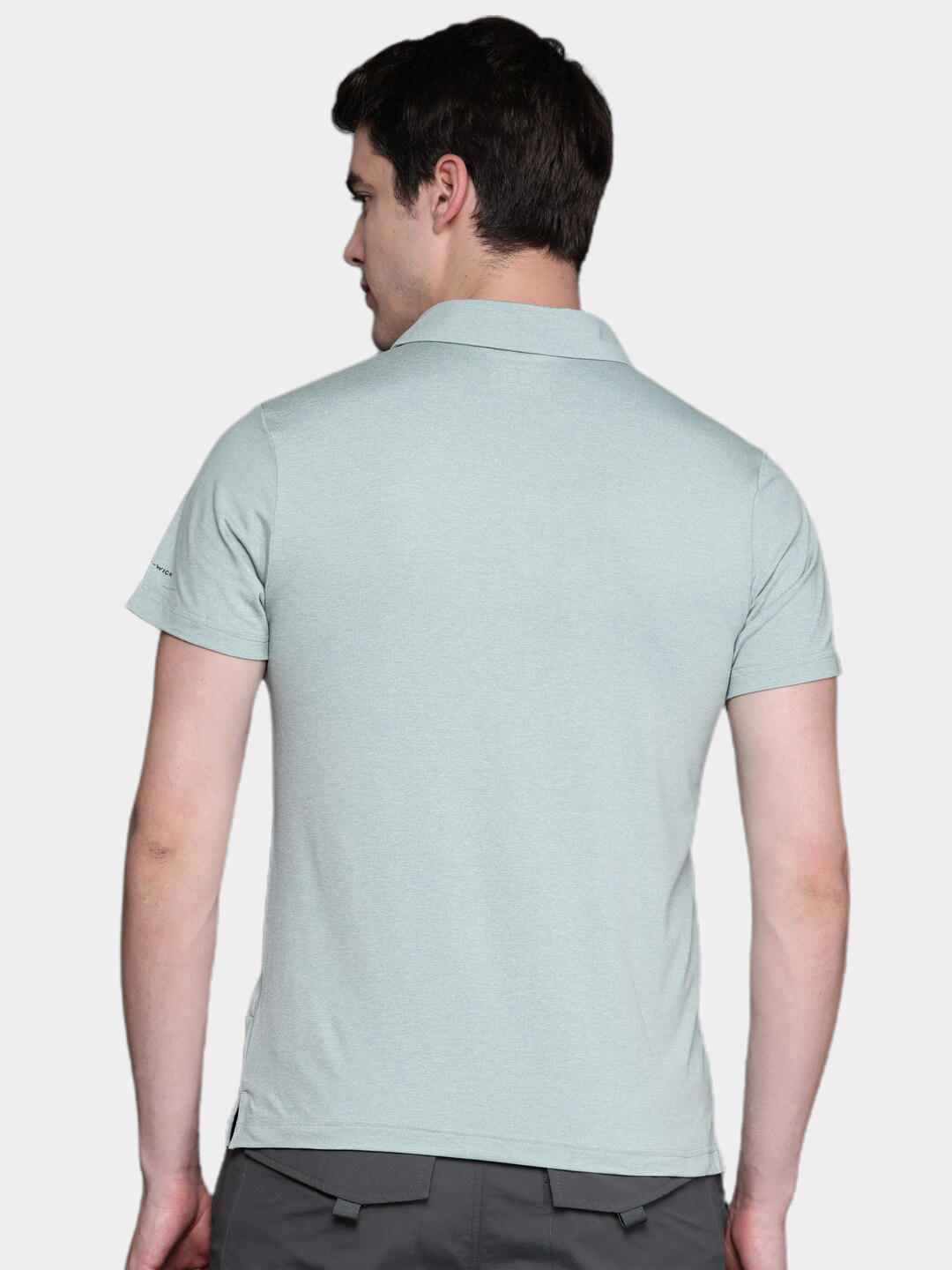 A Men Wearing Columbia Men Green Tech Trail Novelty Polo (Sun Protection)