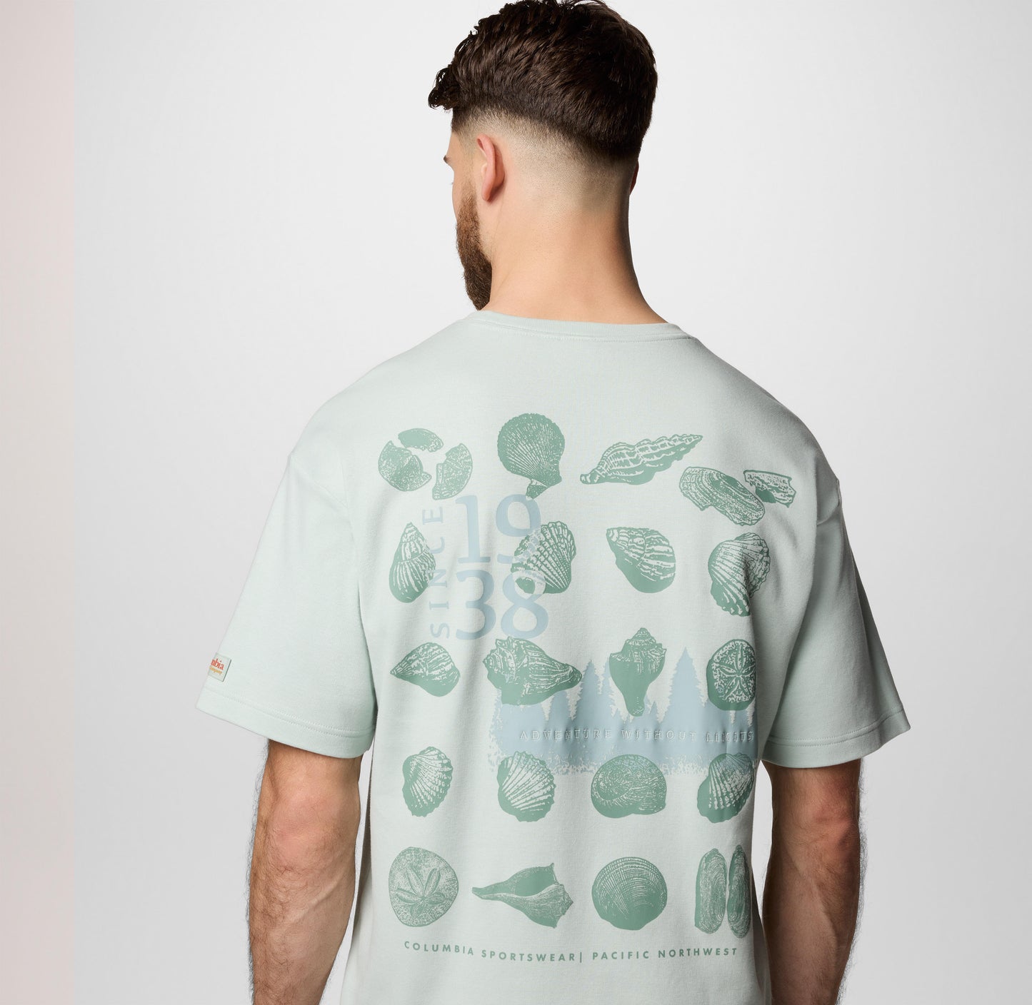 A Men Wearing Columbia Men Green CSC Heritage Graphic Tee (Sun Protection)