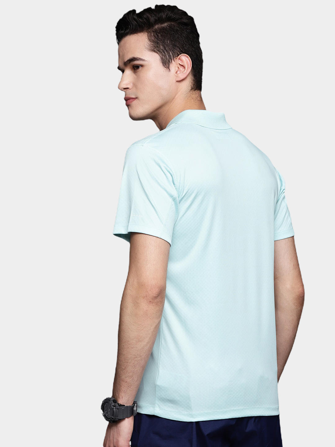 A Men Wearing Columbia Men Green Zero Rules Polo Shirt (Sun Protection)