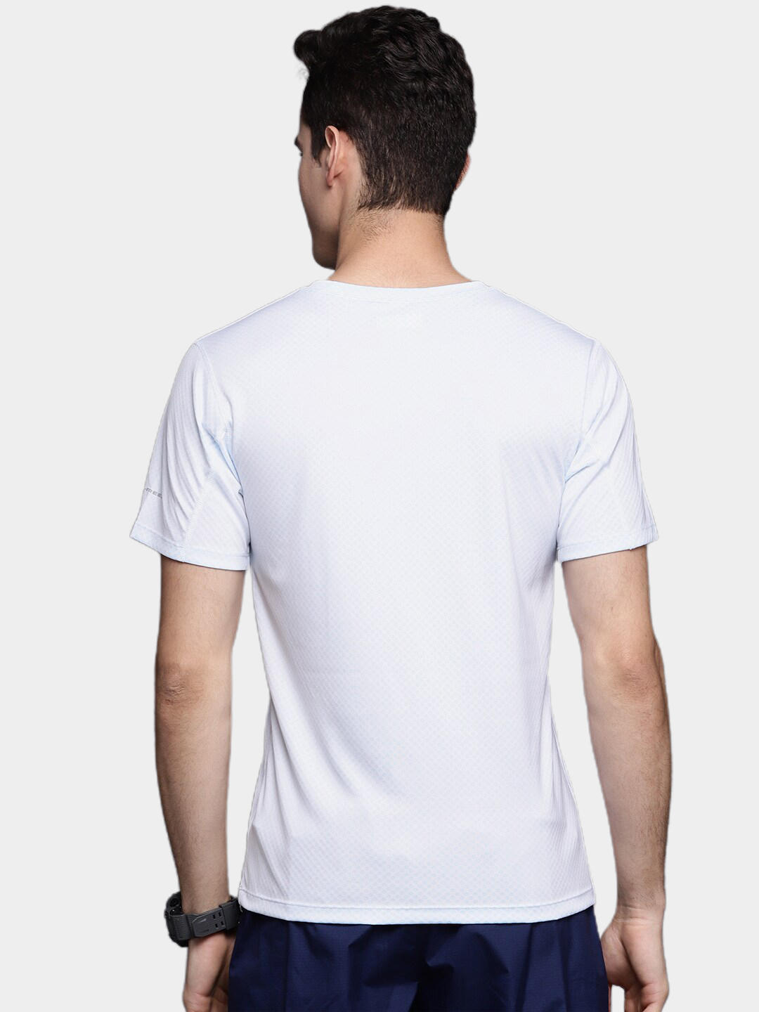 A Men Wearing Columbia Men White Zero Rules Short Sleeve Graphic Shirt (Sun Protection)