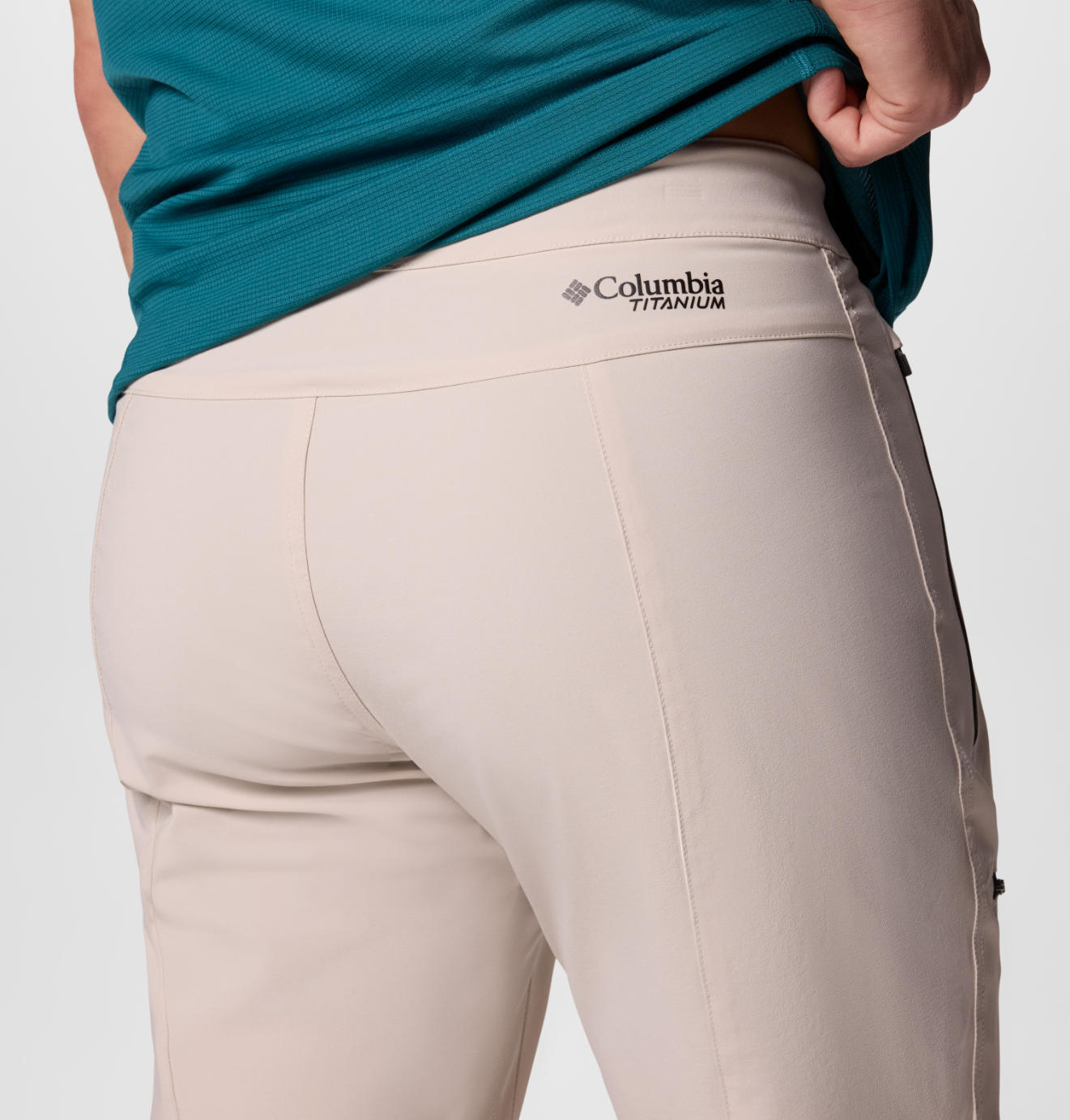 A Men Wearing Columbia Men Brown Titan Pass Pant II (Sun Protection)