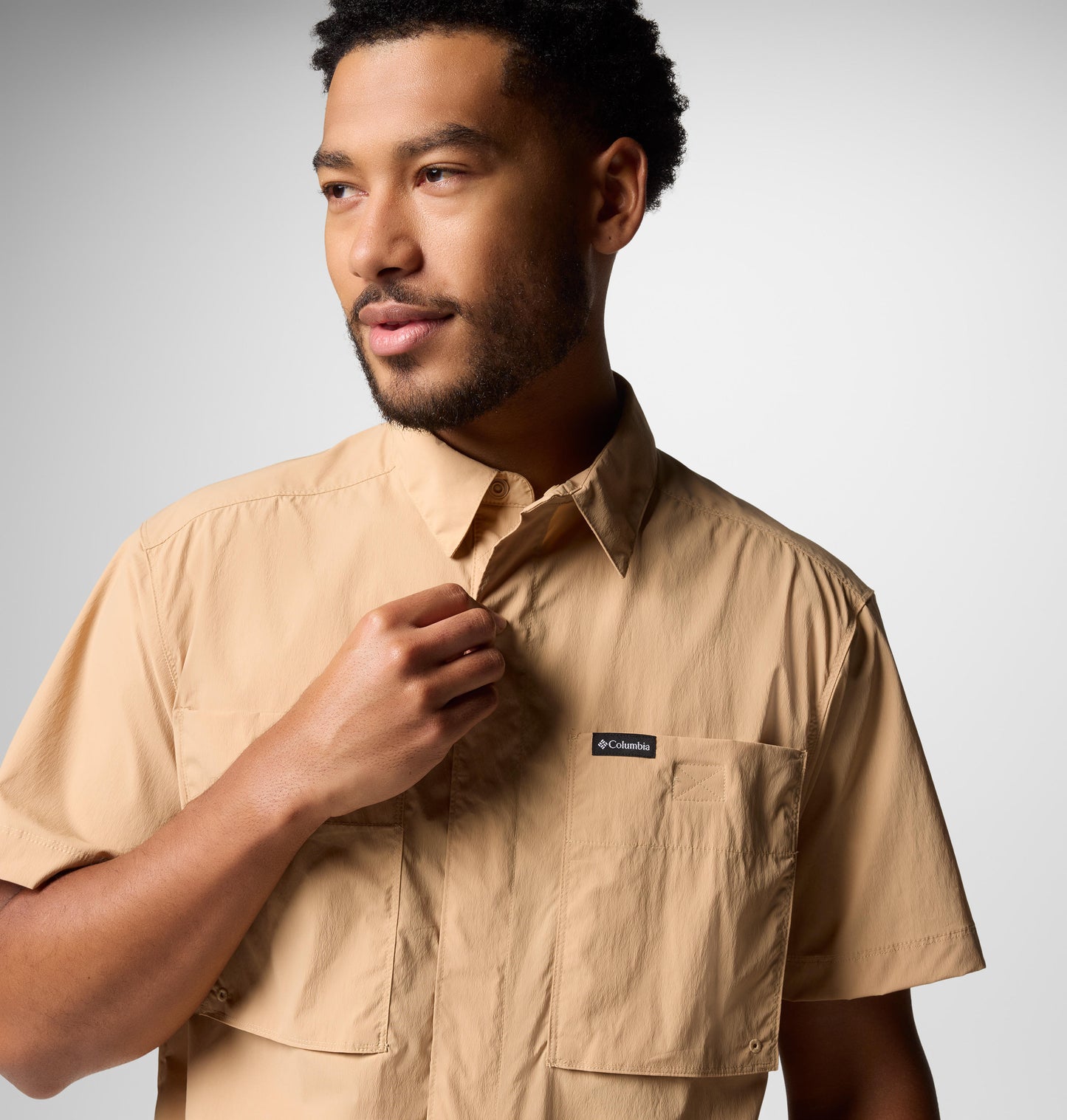 A Men Wearing Columbia Men Brown Black Mesa Utility SS Shirt