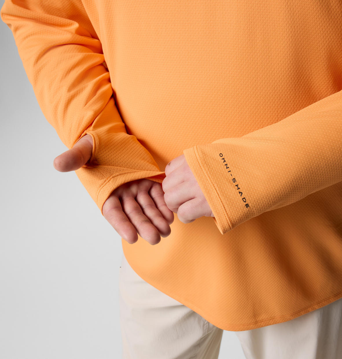 A Men Wearing Columbia Men Orange Summit Valley Hoodie (Sun Protection)