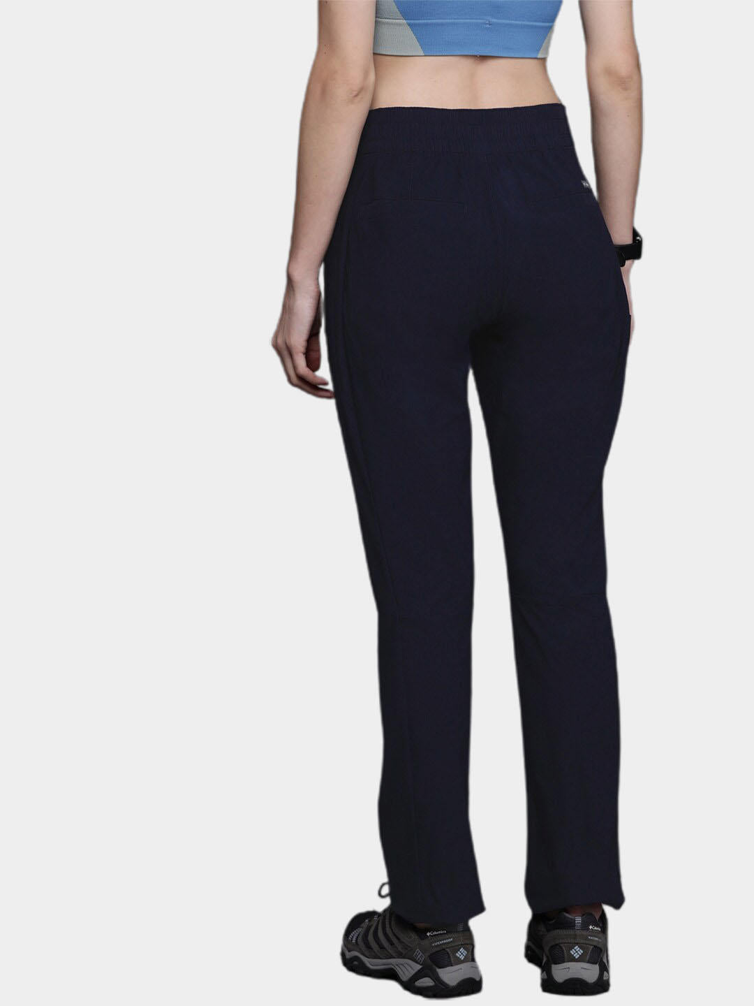A Women Wearing Columbia Women Navy Blue Firwood Core Pant (Sun Protection)