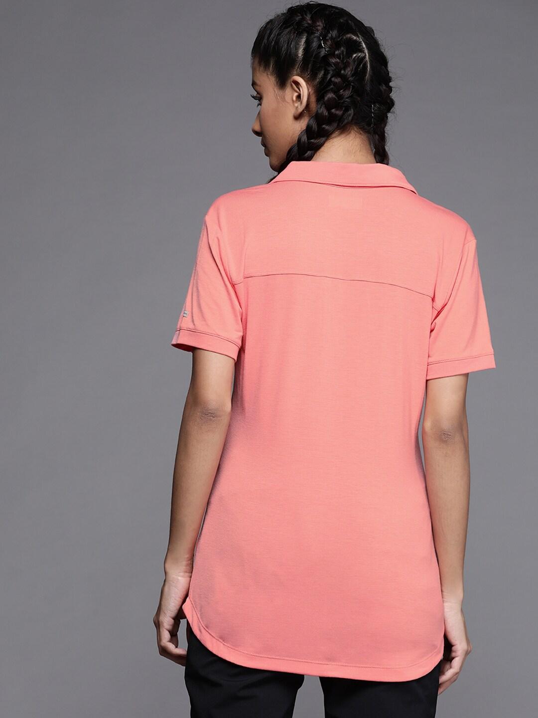 A Women Wearing Columbia Women Red Essential Elements Polo (Sun Protection)