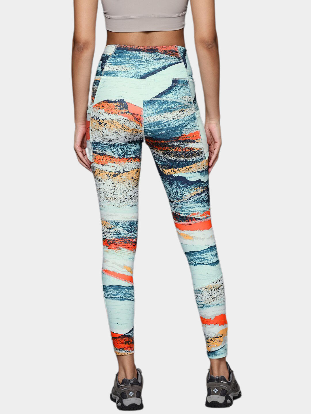 A Women Wearing Columbia Women Green Windgates II Legging (Sun Protection)