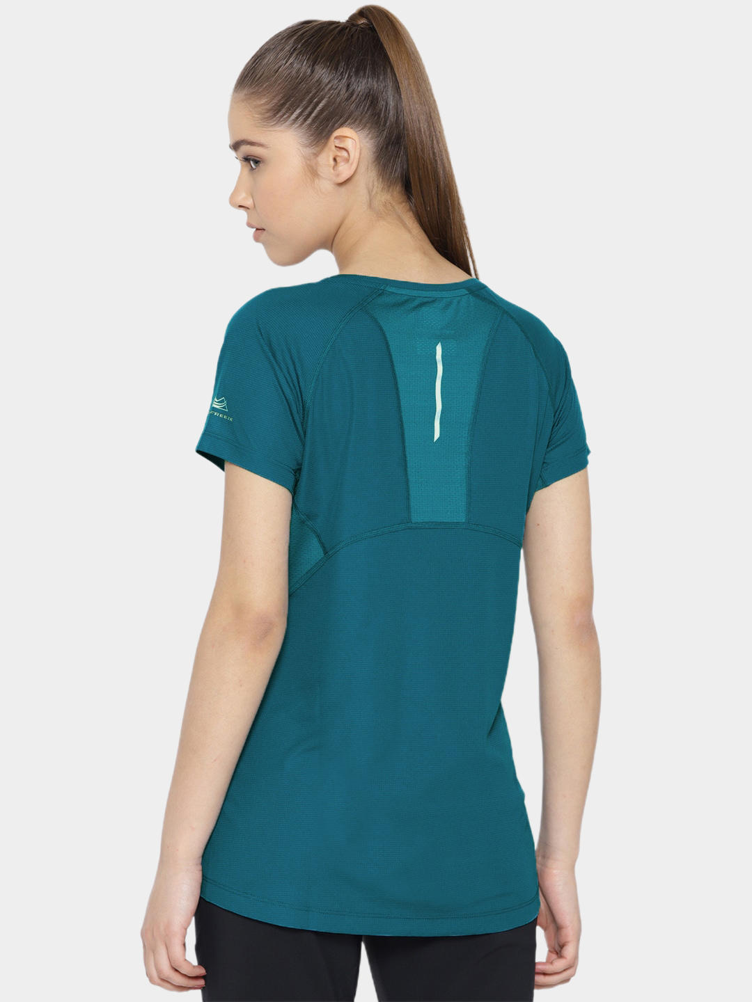 A Women Wearing Columbia Women Blue Titan Ultra II Short Sleeve