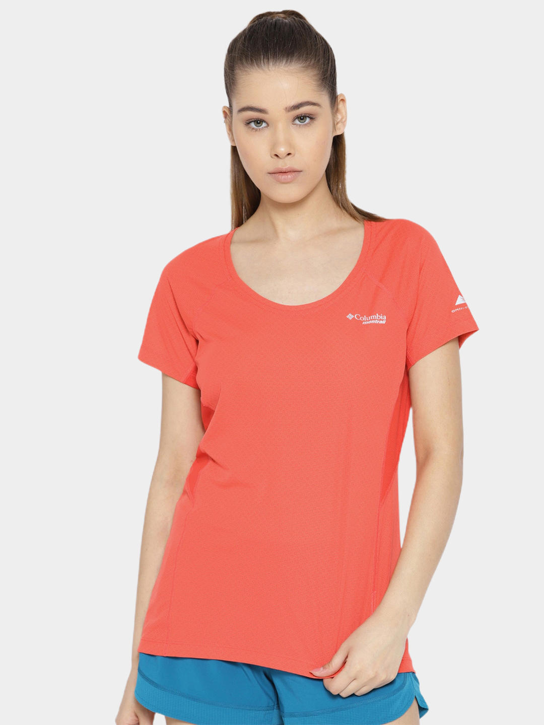 A Women Wearing Columbia Women Red Titan Ultra II Short Sleeve