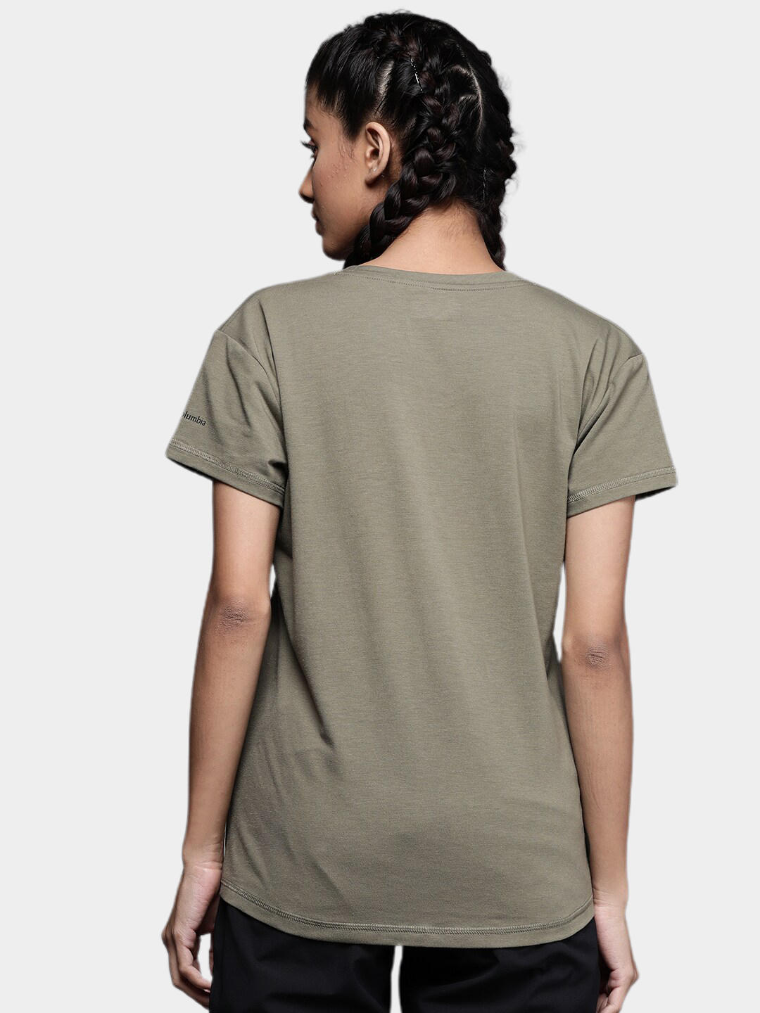 A Women Wearing Columbia Women Green Sun Trek SS Tee