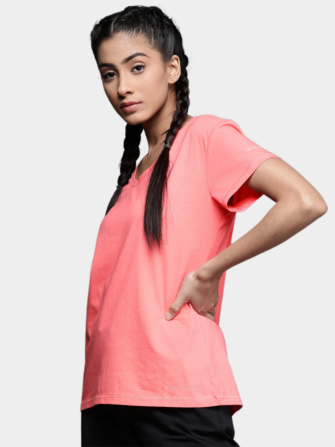 A Women Wearing Columbia Women Red Sun Trek SS Tee