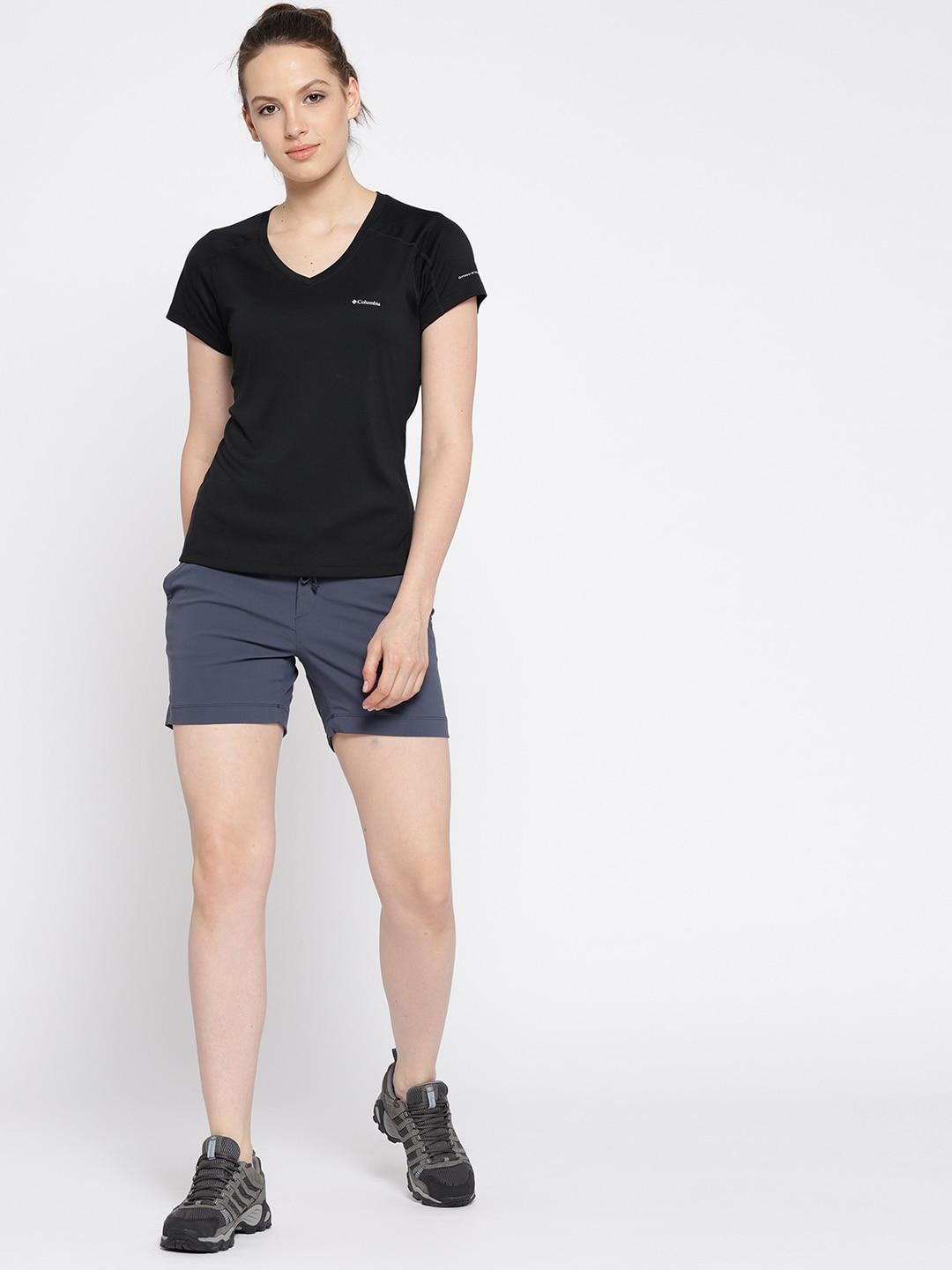 A Women Wearing Columbia Women Navy Blue Anytime Outdoor Short (Sun Protection)