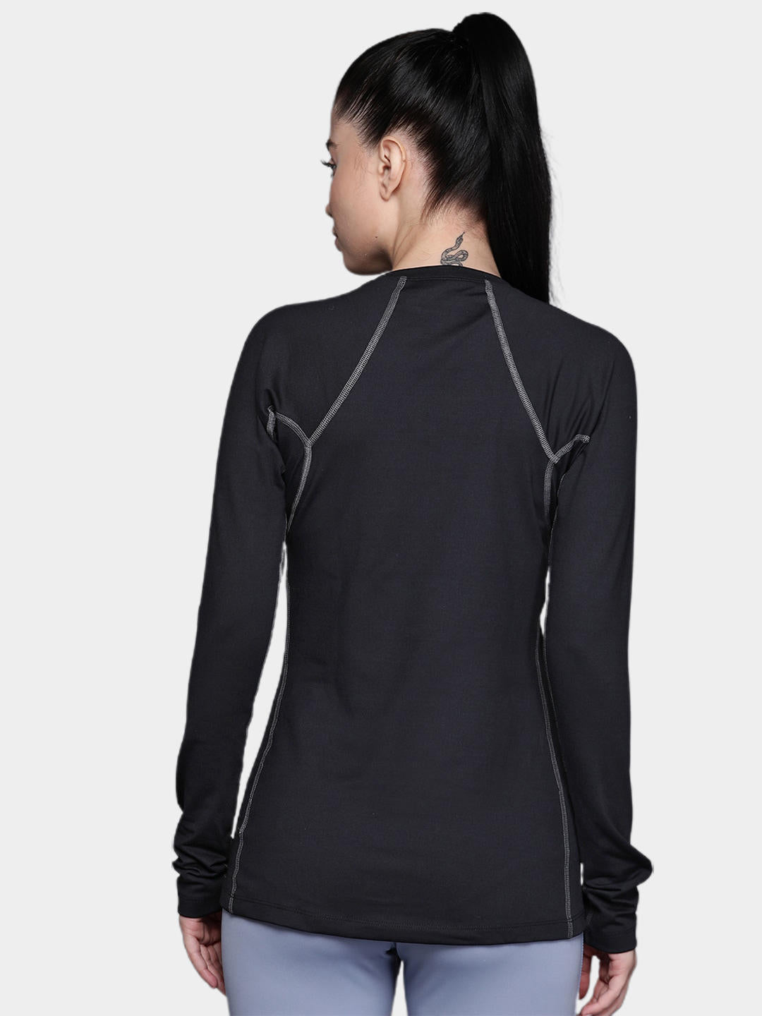 A Women Wearing Columbia Women Black Heavyweight Stretch Long Sleeve Top (Non Returnable)
