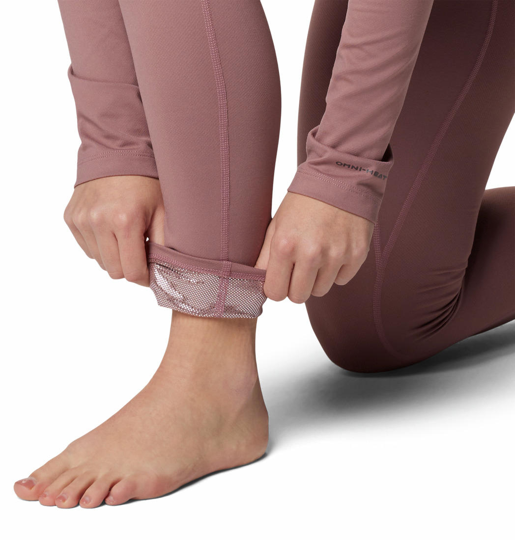 A Women Wearing Columbia Women Red Midweight Stretch Tight (Non Returnable)