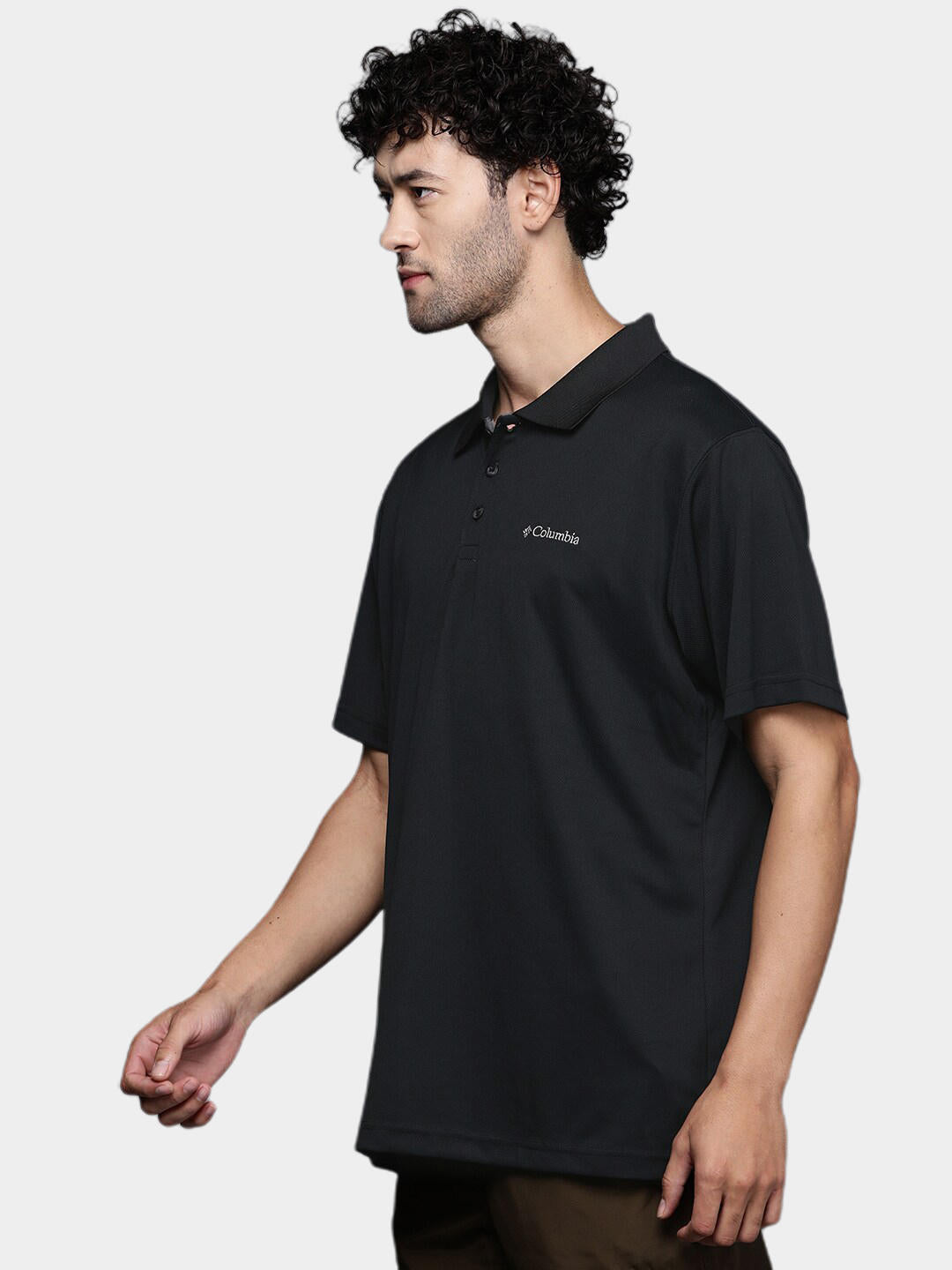 A Men Wearing Columbia Men Black Utilizer Polo (Sun Protection)