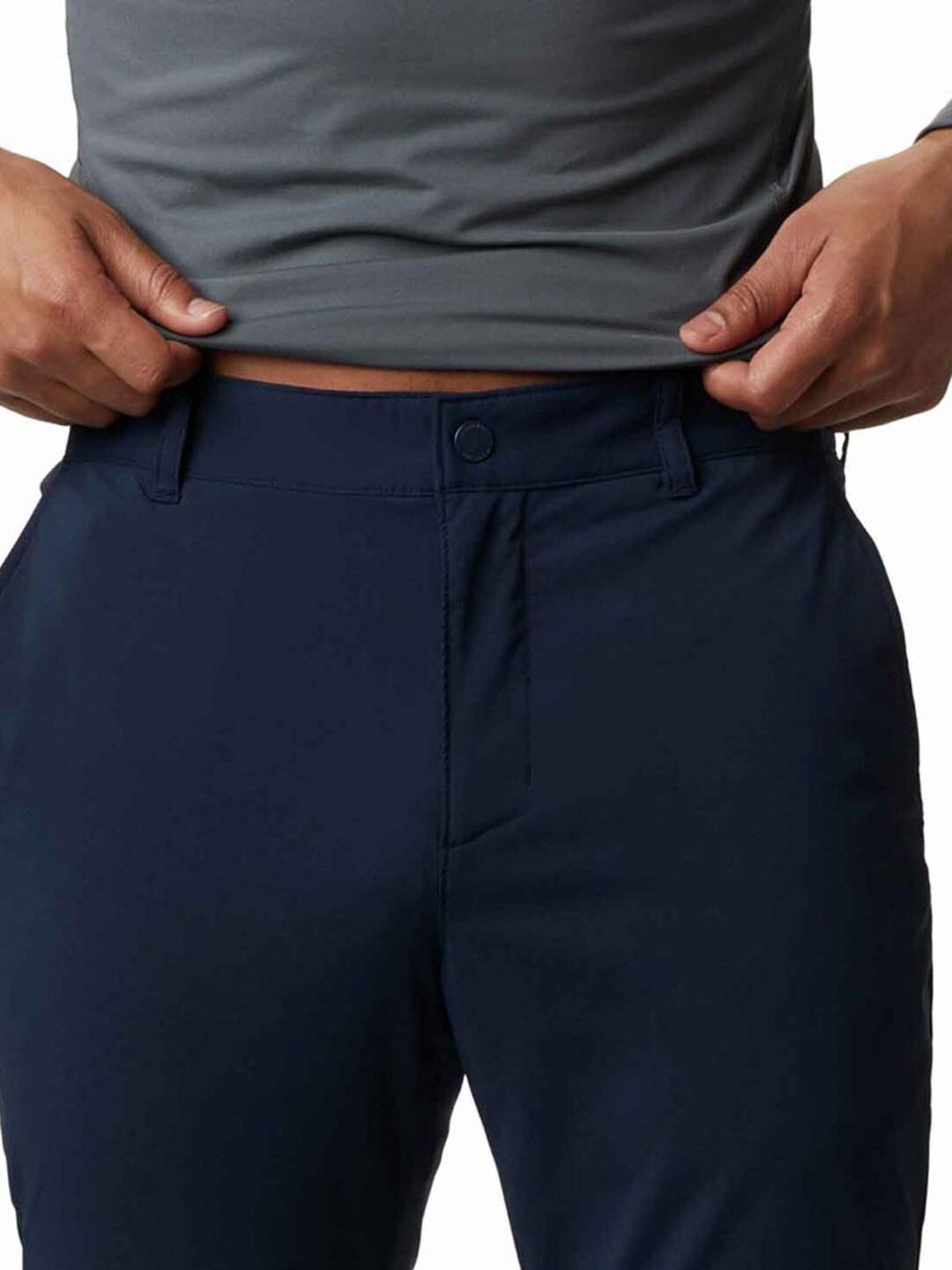 A Men Wearing Columbia Men Blue Tech Trail Hiker Pant (Sun Protection)