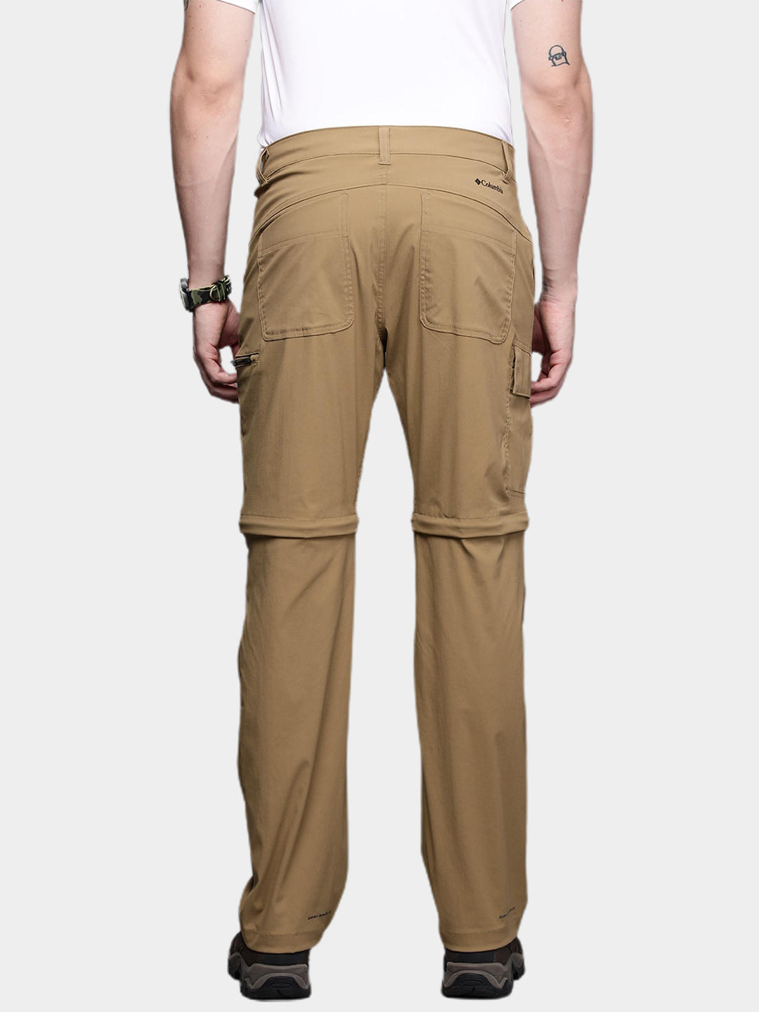 A Men Wearing Columbia Men Brown Newton Ridge Convertible Pant (Sun Protection)