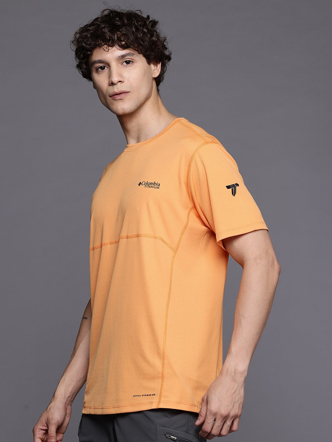 A Men Wearing Columbia Men Orange Cirque River Pro SS Crew (Sun Protection)