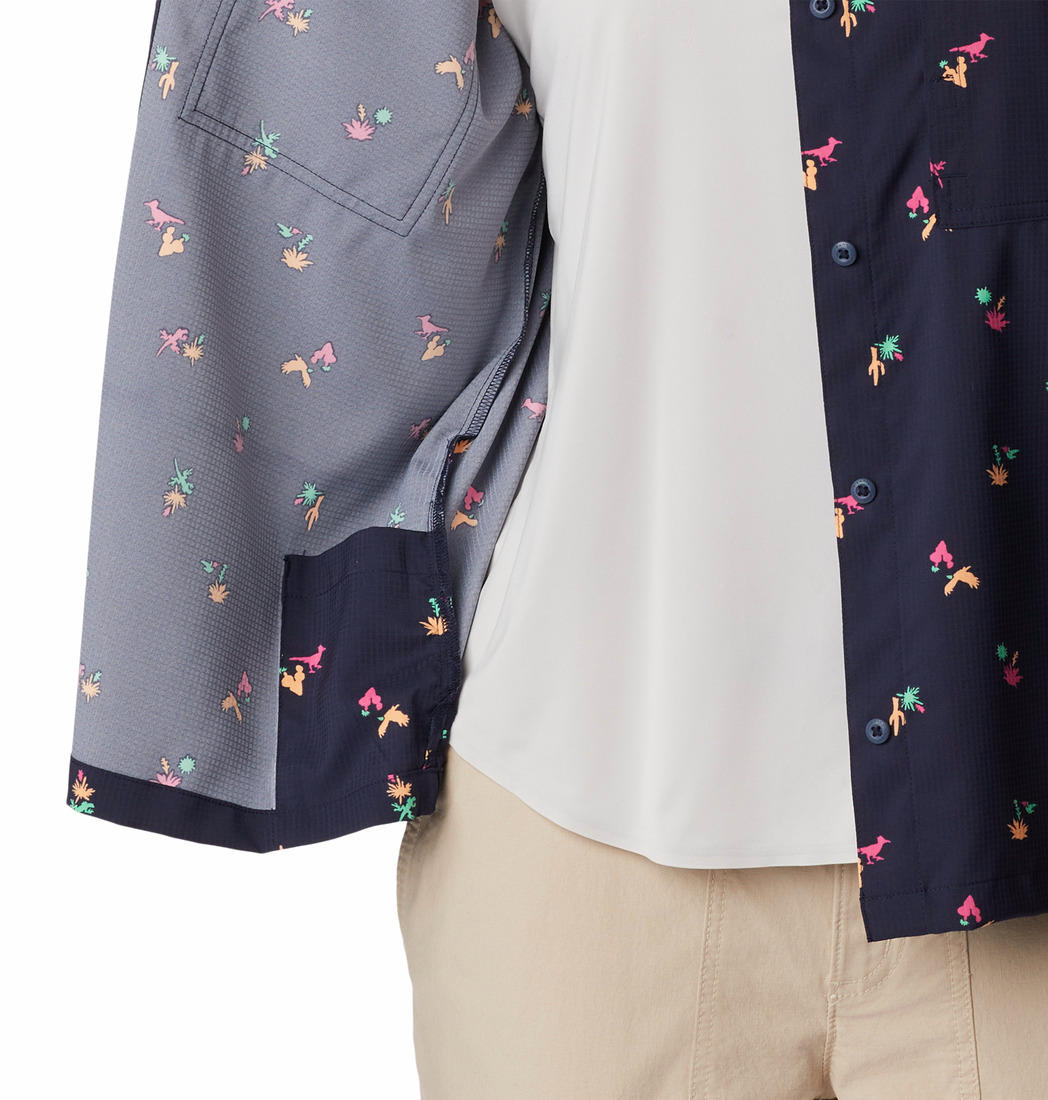 A Women Wearing Columbia Women Navy Blue Silver Ridge Utility SS Shirt (Sun Protection)
