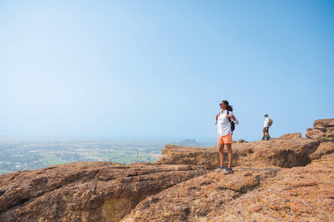 A Women Wearing Columbia Women Peach Silver Ridge Utility Short (Sun Protection)