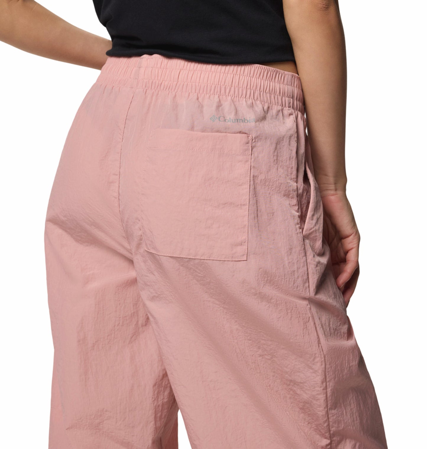 A Women Wearing Columbia Women Pink Paracutie Vented Pant