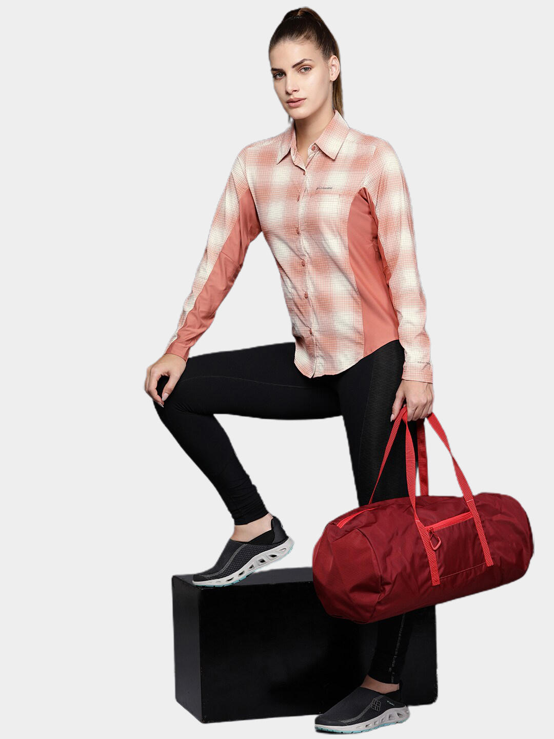 A Women Wearing Columbia Women Red Claudia Ridge LS Shirt