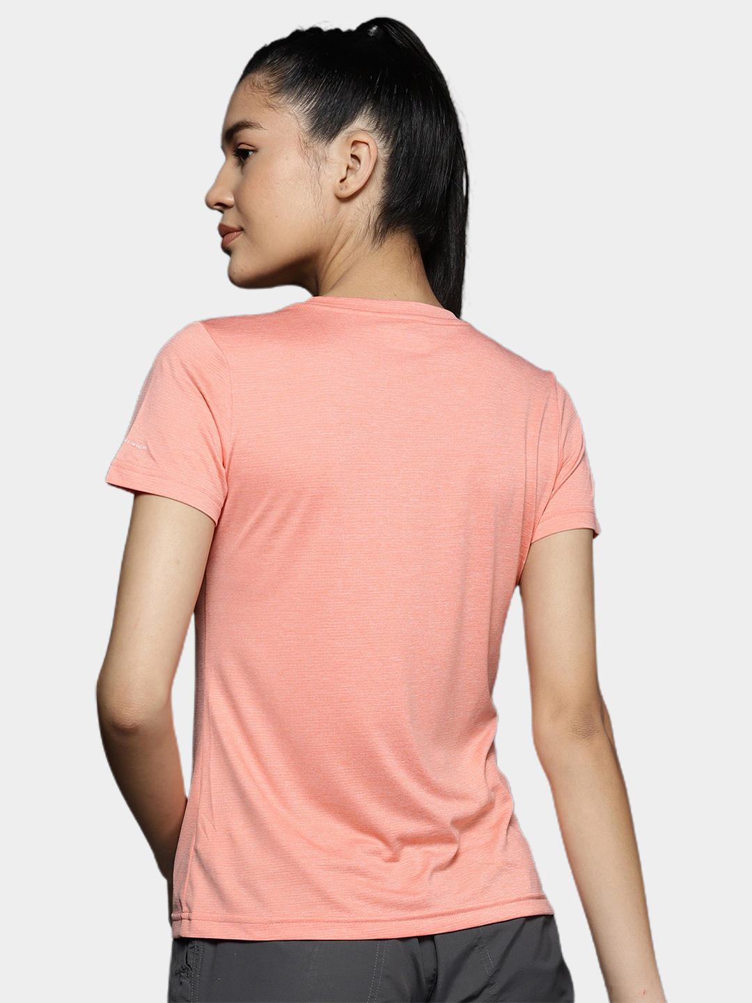 A Women Wearing Columbia Women Peach Columbia Hike SS Crew