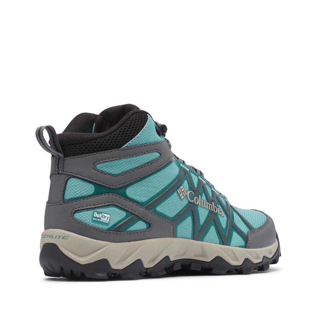 A Women Wearing Columbia Women Green PEAKFREAK X2 MID OUTDRY