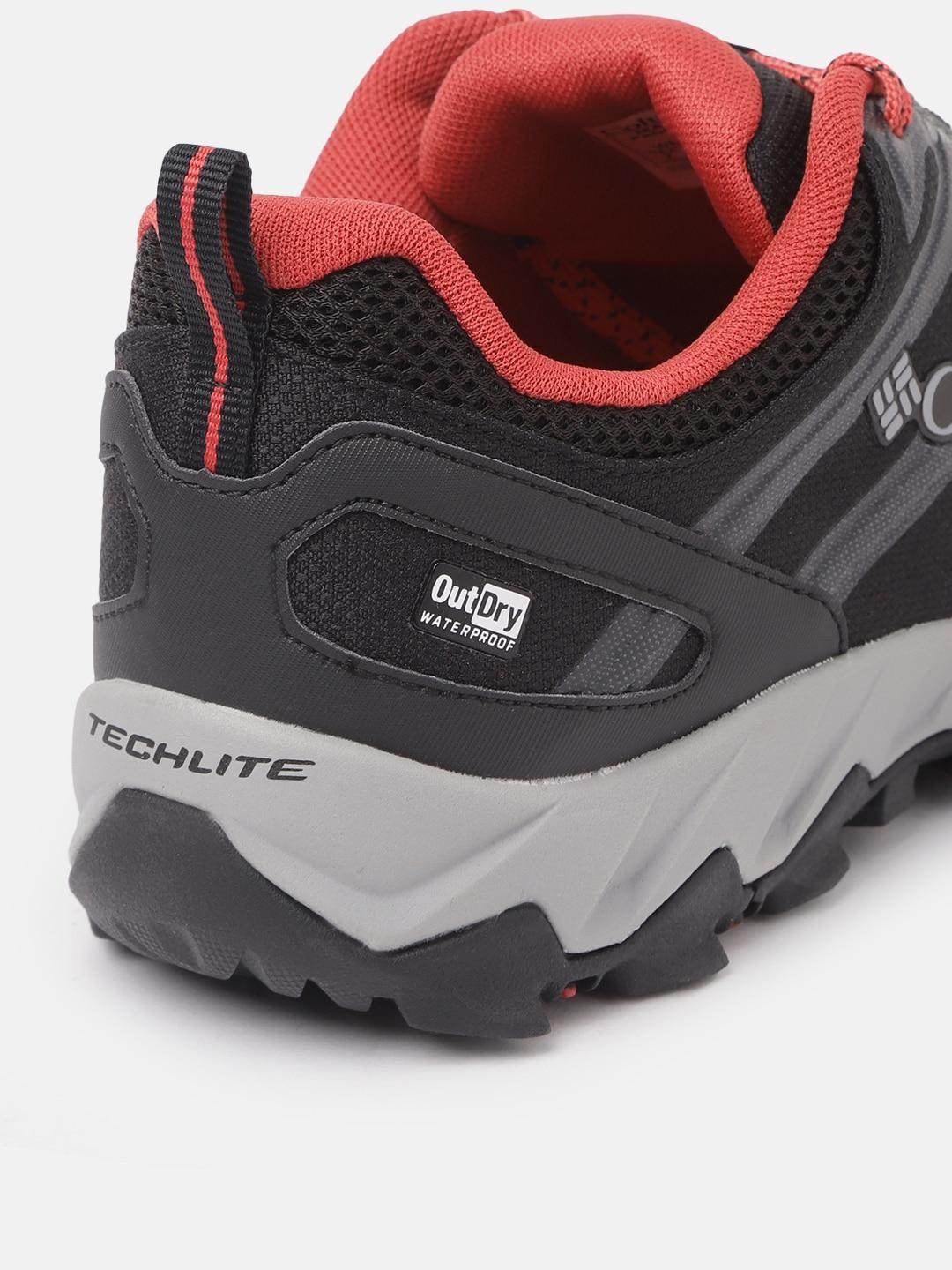 A Women Wearing Columbia Women Black PEAKFREAK X2 OUTDRY