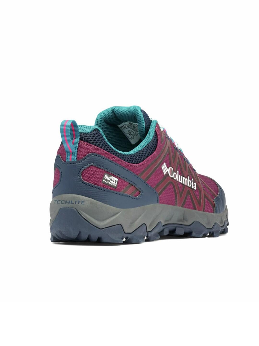A Women Wearing Columbia Women Purple PEAKFREAK X2 OUTDRY