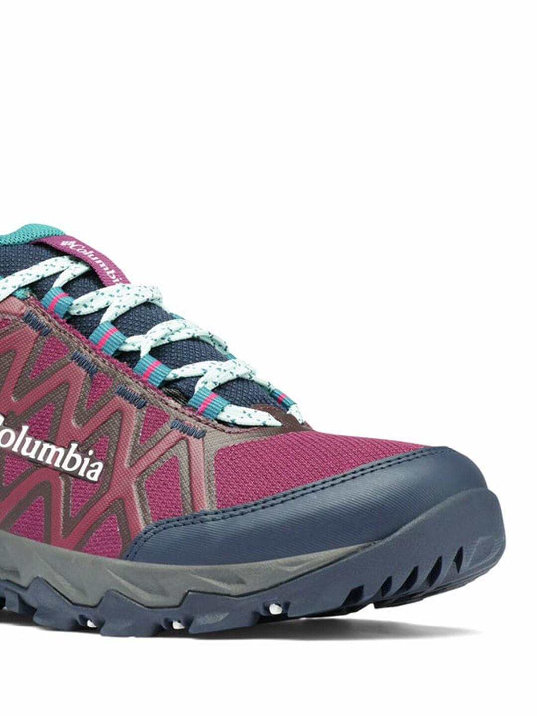 A Women Wearing Columbia Women Purple PEAKFREAK X2 OUTDRY