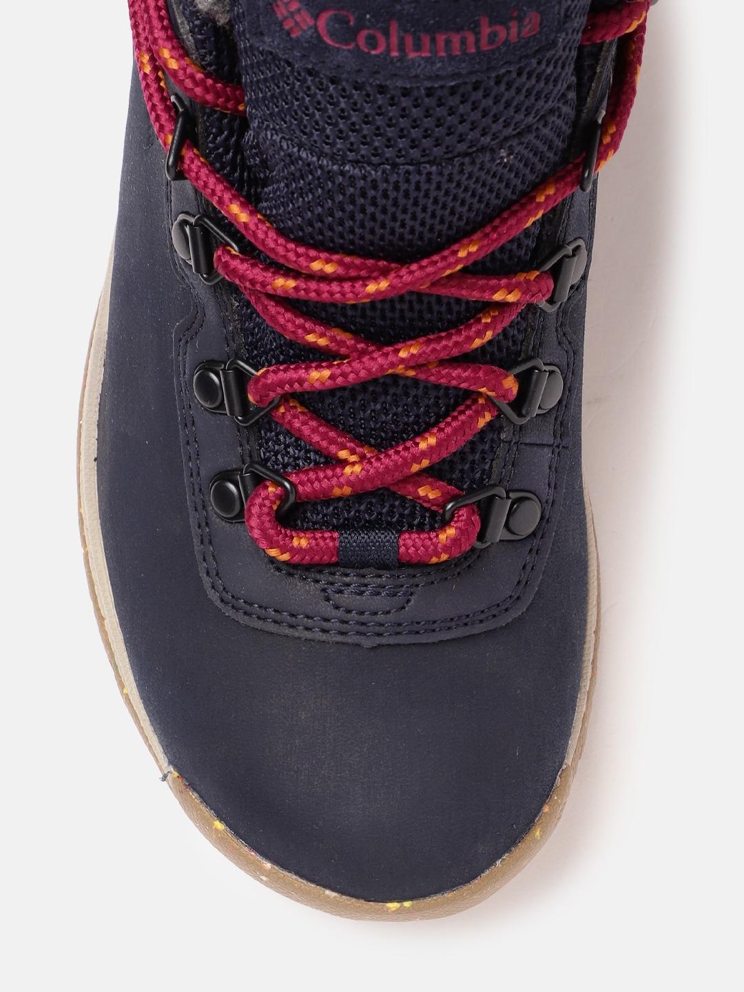 A Women Wearing Columbia Women Navy Blue NEWTON RIDGE PLUS OMNI HEAT