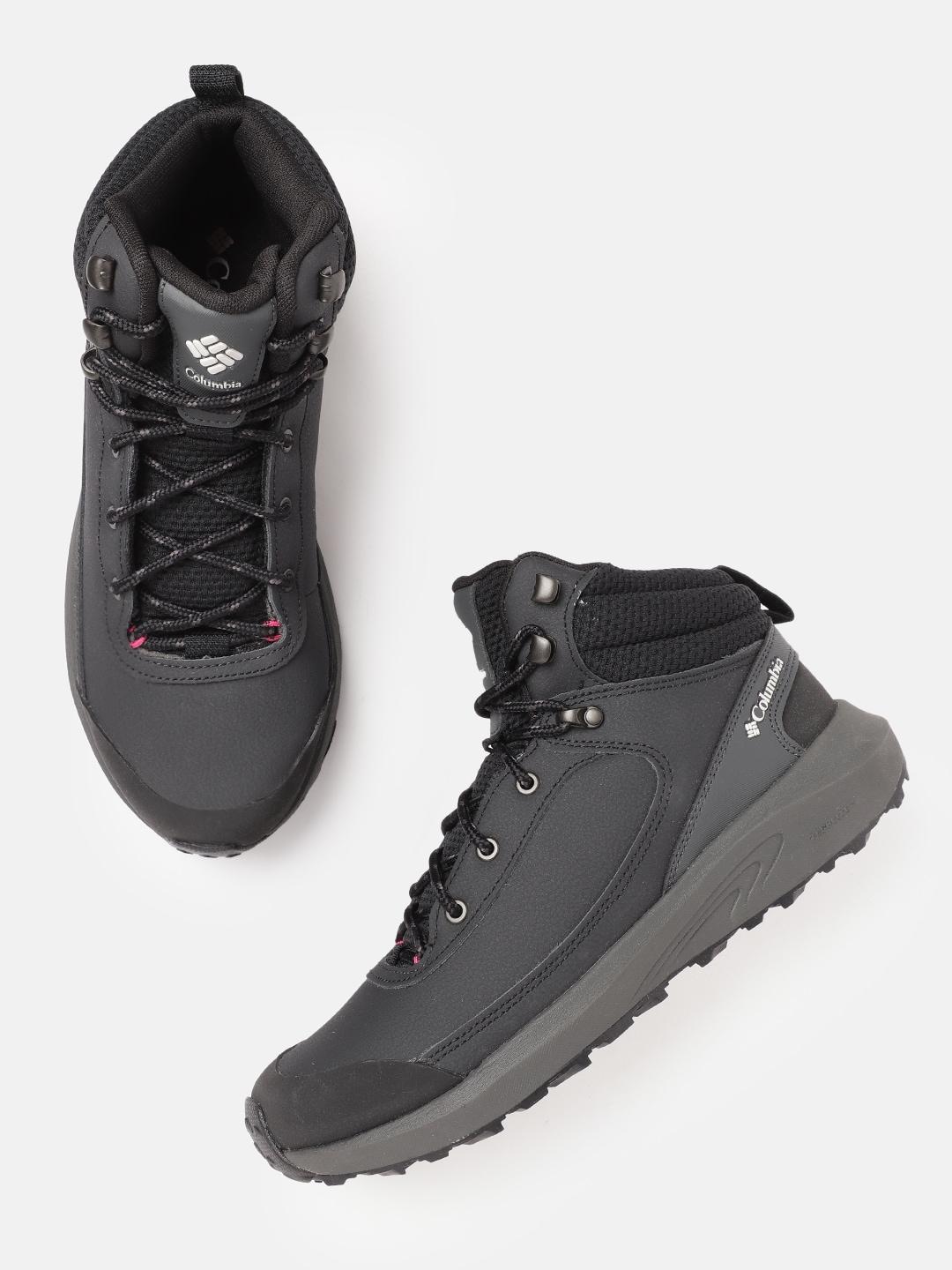A Women Wearing Columbia Women Black TRAILSTORM PEAK MID