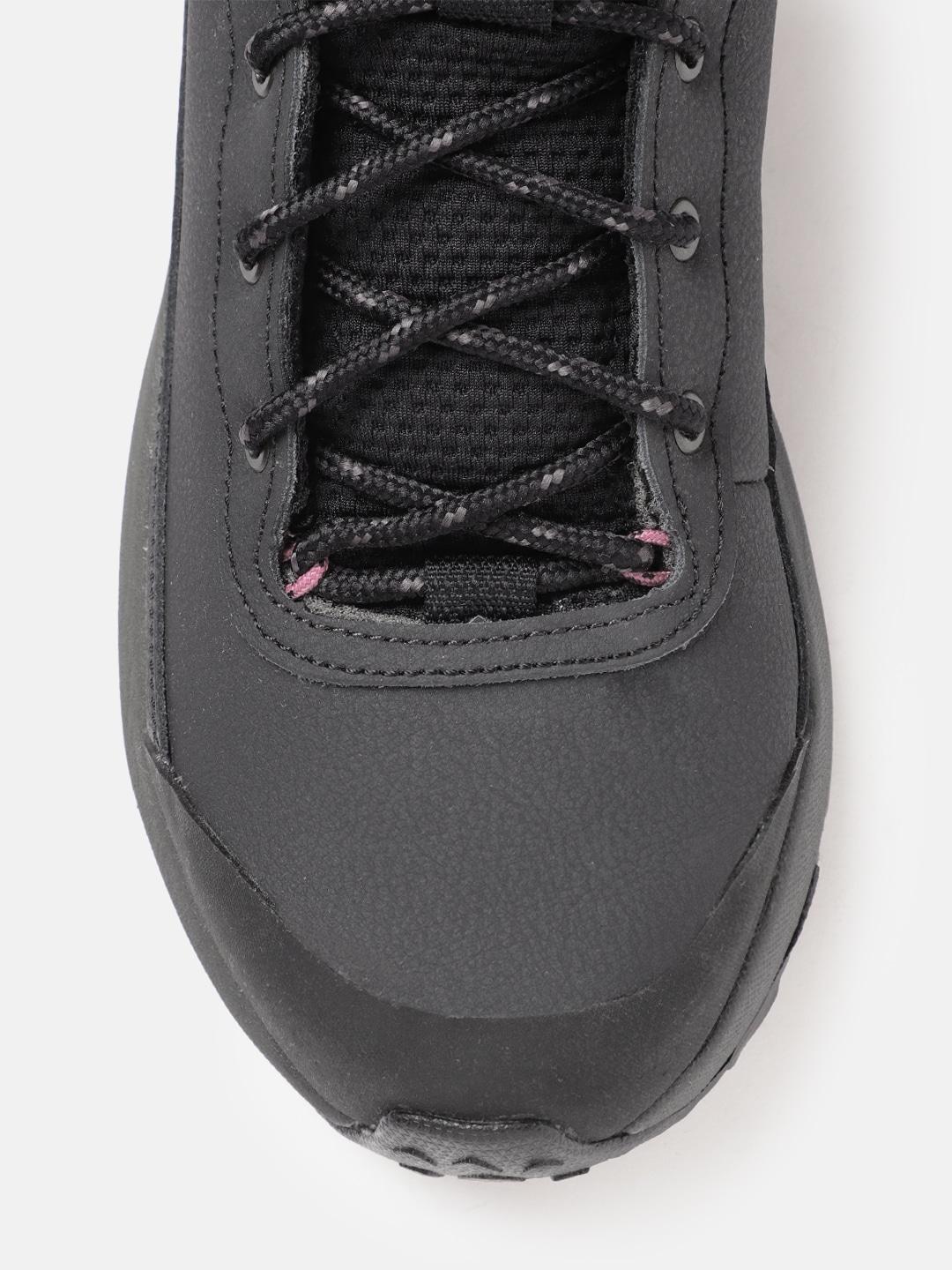 A Women Wearing Columbia Women Black TRAILSTORM PEAK MID