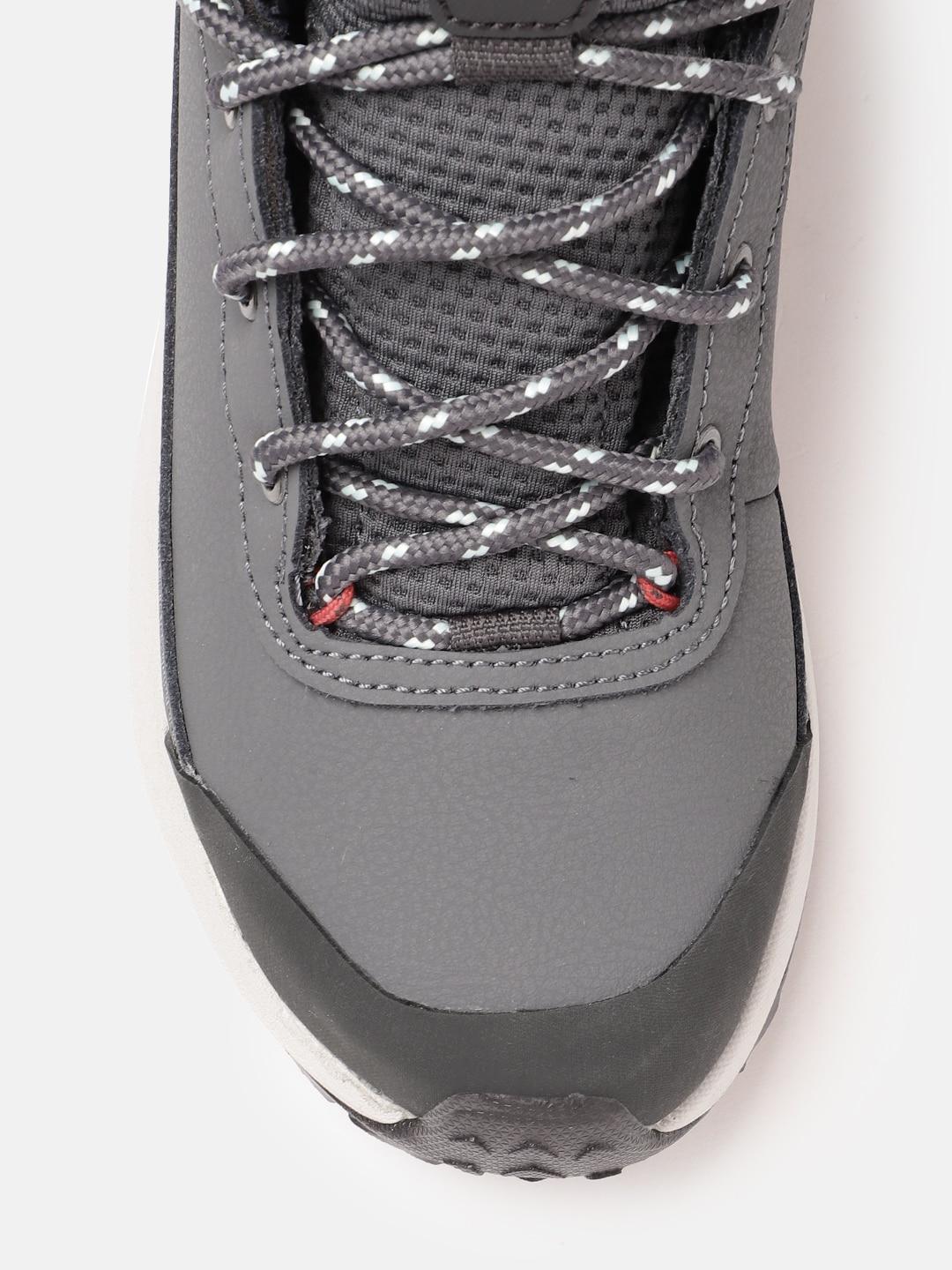 A Women Wearing Columbia Women Grey TRAILSTORM PEAK MID