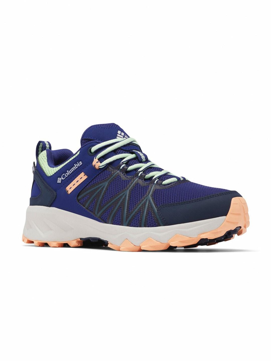 A Women Wearing Columbia Women Navy Blue PEAKFREAK II OUTDRY