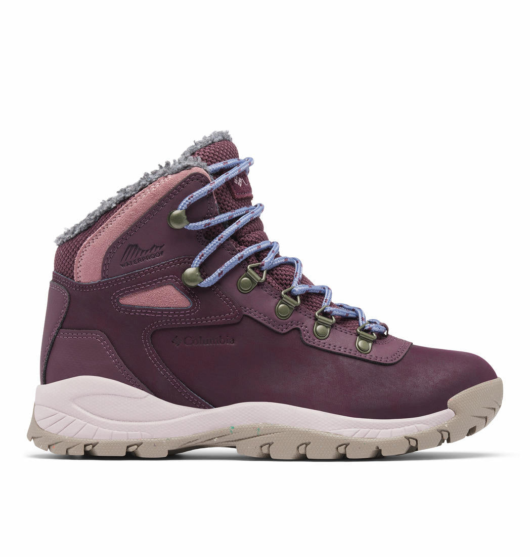 A Women Wearing Columbia Women Red NEWTON RIDGE WP OMNI-HEAT II