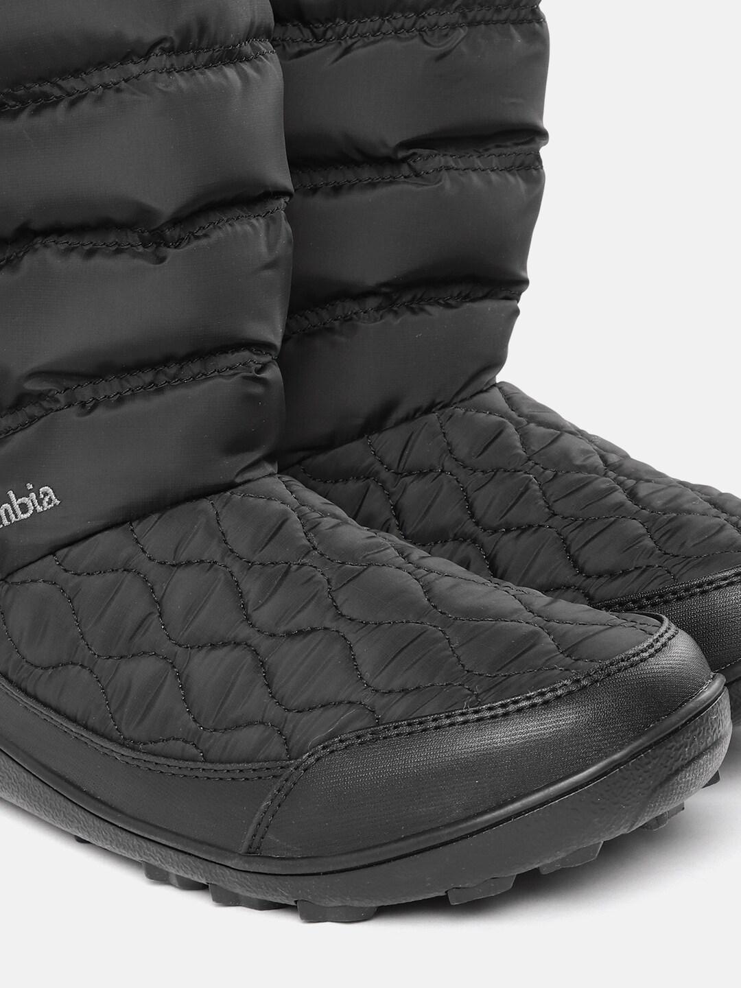 A Women Wearing Columbia Women Black MINX SLIP IV