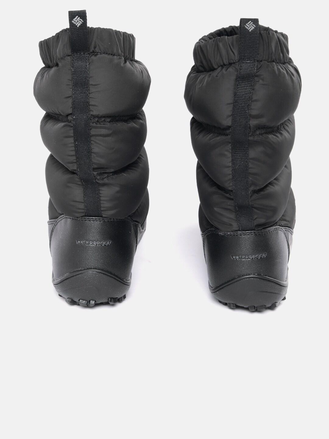 A Women Wearing Columbia Women Black MINX SLIP IV