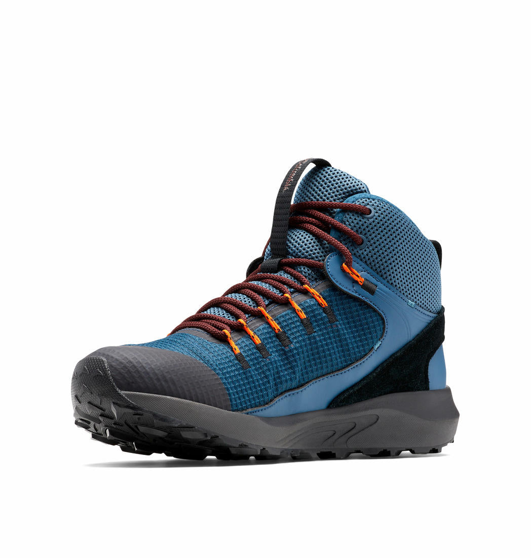 A Men Wearing Columbia Men Blue Trailstorm Mid Waterproof