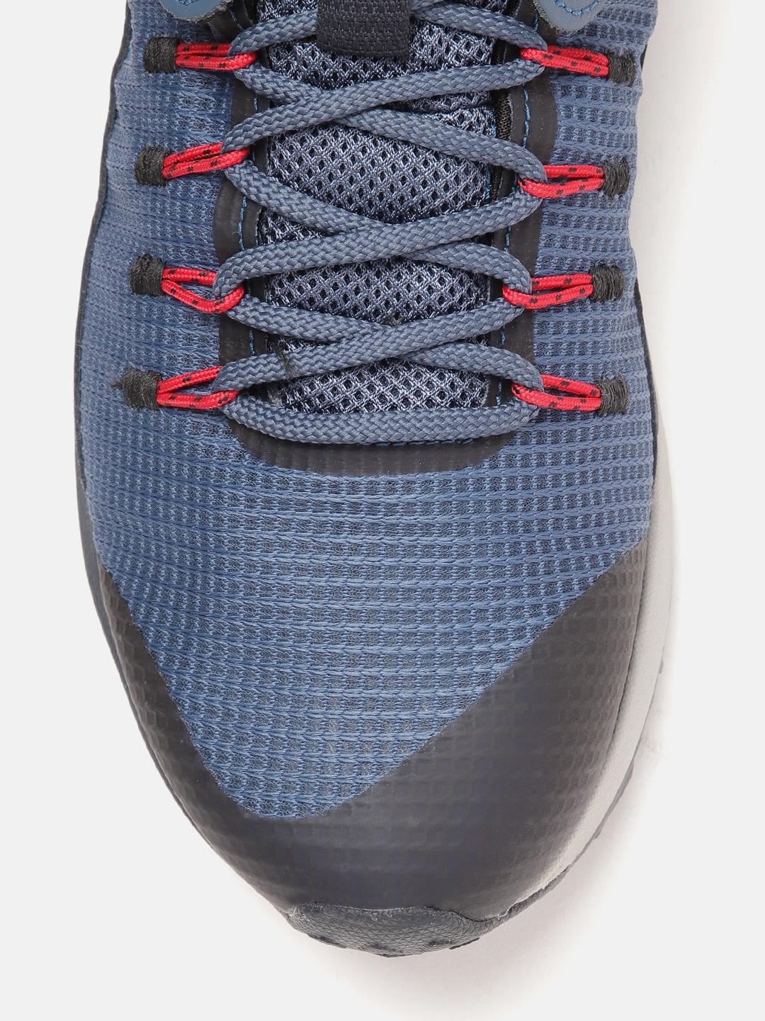 A Men Wearing Columbia Men Blue TRAILSTORM WATERPROOF