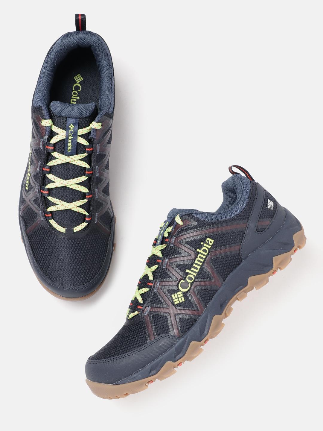 A Men Wearing Columbia Men Navy Blue PEAKFREAK X2 OUTDRY