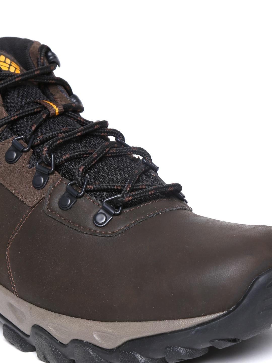 A Men Wearing Columbia Men Brown NEWTON RIDGE PLUS II WATERPROOF