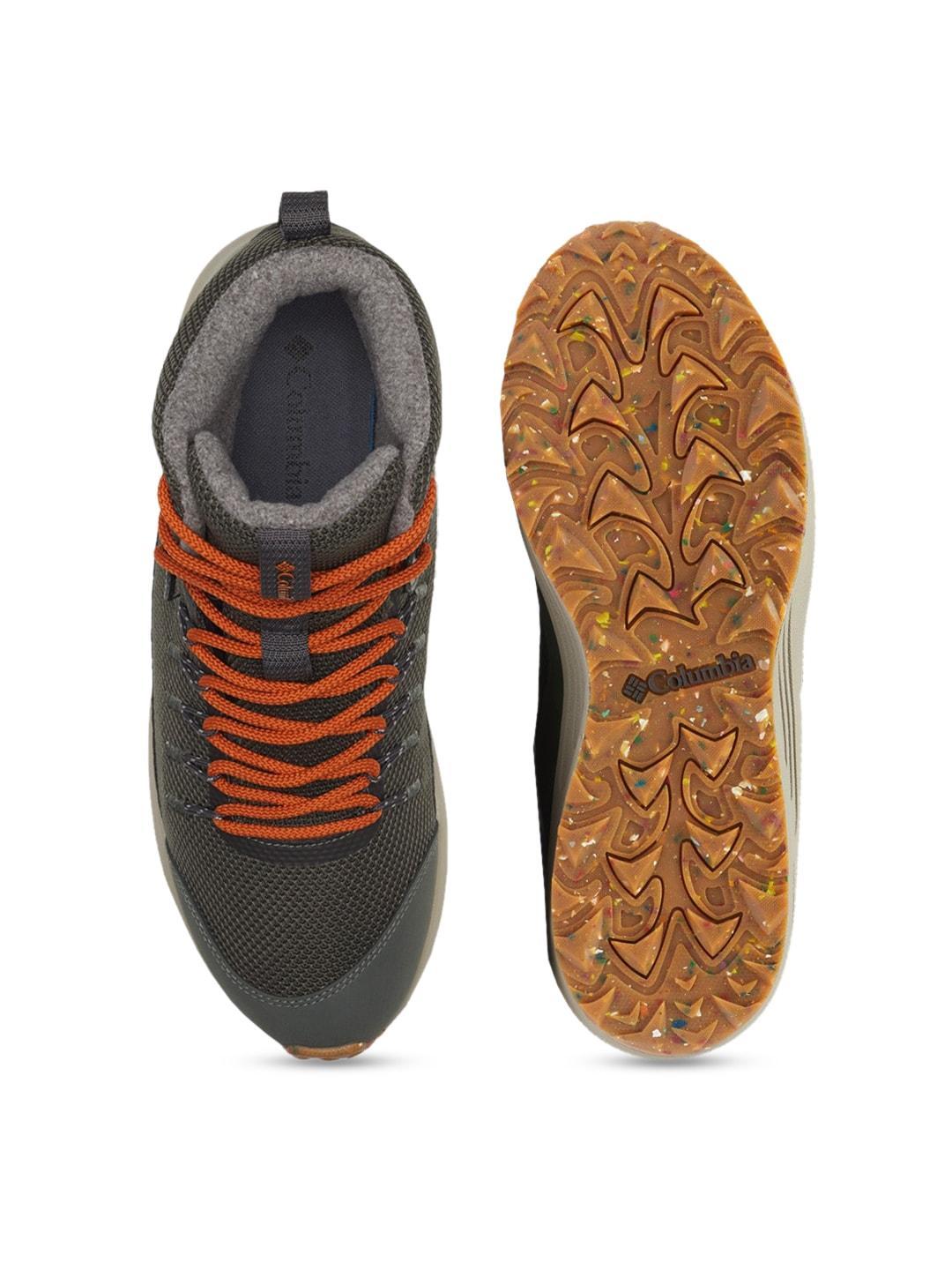 A Men Wearing Columbia Men Green TRAILSTORM MID WATERPROOF OMNI HEAT
