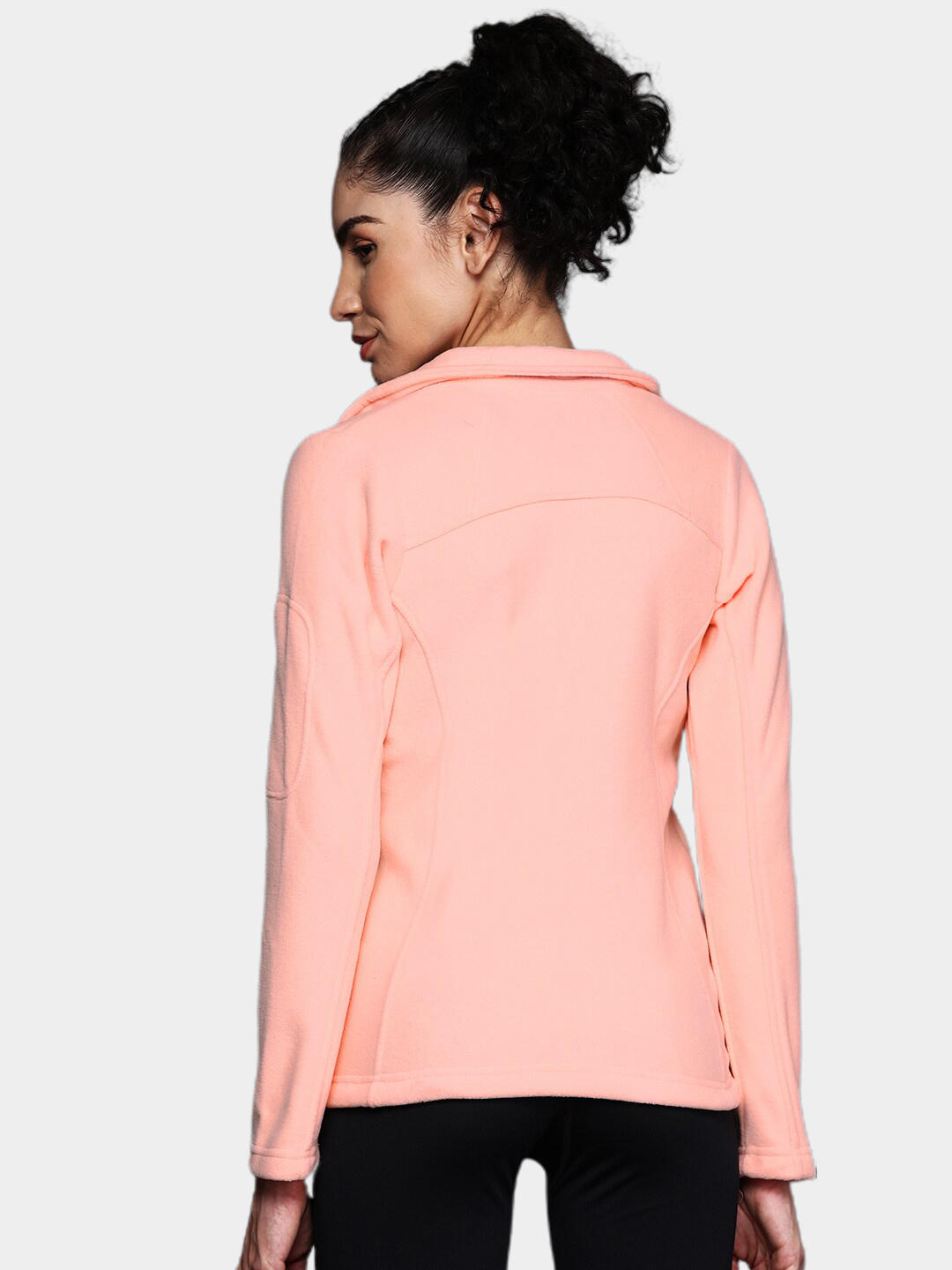 A Women Wearing Columbia Women Peach Fast Trek II Jacket