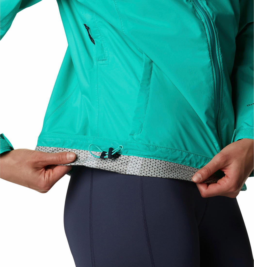 A Women Wearing Columbia Women Green EvaPOURation Jacket Waterproof