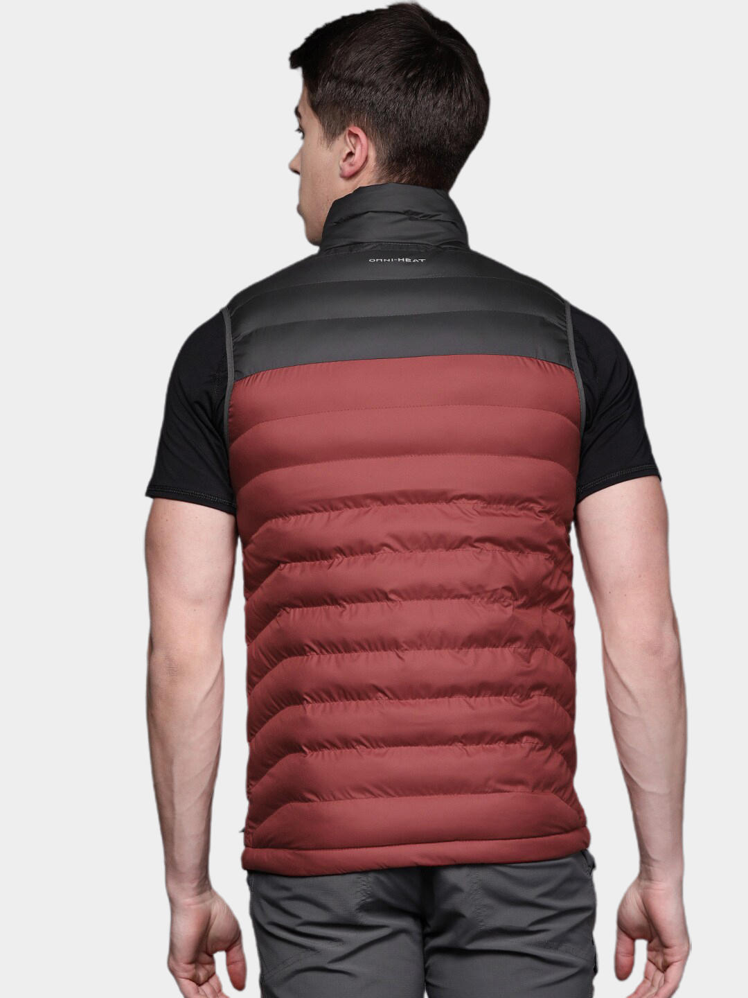 A Men Wearing Columbia Men Red Powder Lite Vest