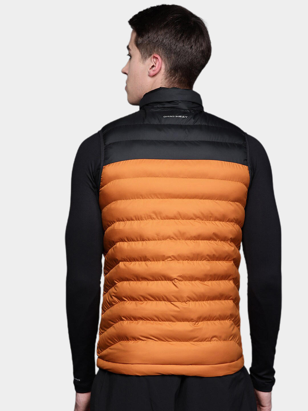 A Men Wearing Columbia Men Orange Powder Lite Vest