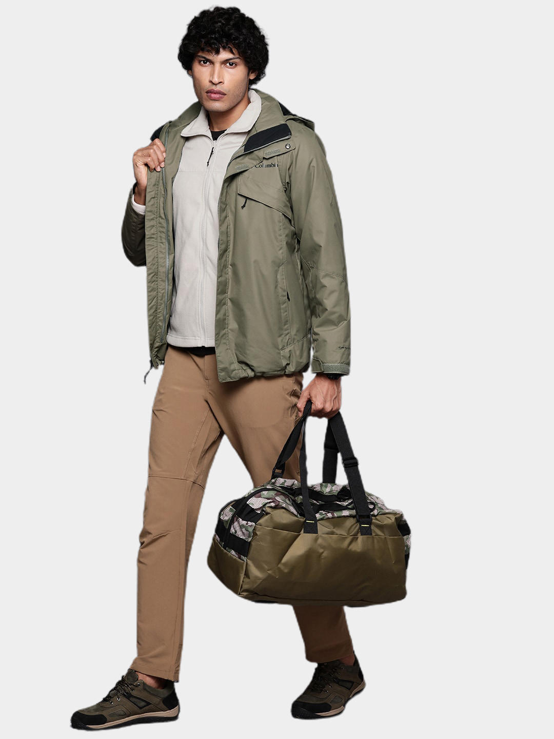 A Men Wearing Columbia Men Green Bugaboo II Fleece Interchange Jacket